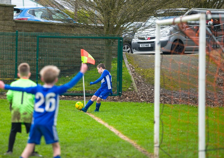 Kids playing football