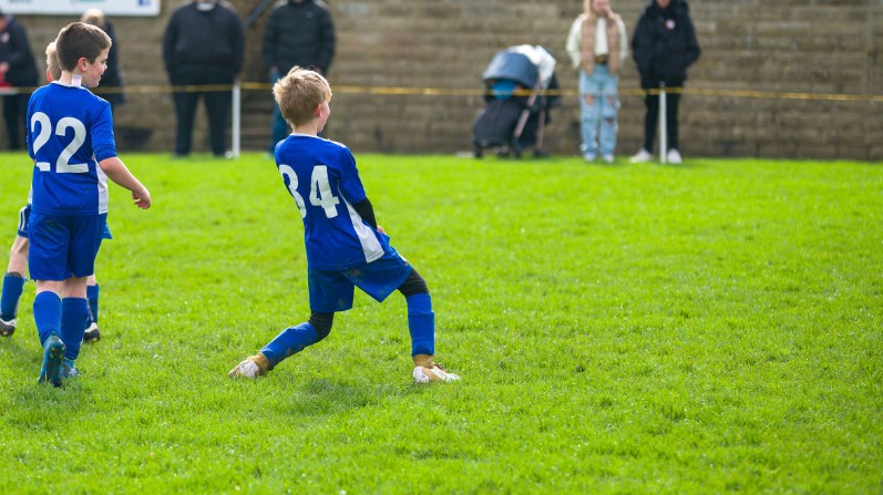 Kids playing football
